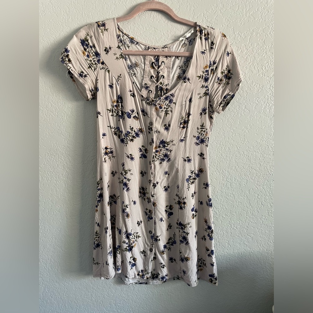 Floral button up dress.